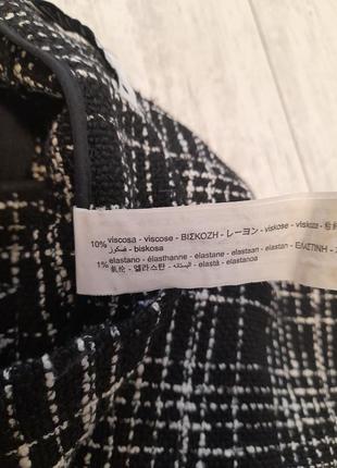 Черные брюки в клетку6 фото