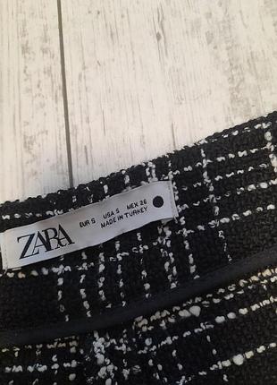 Черные брюки в клетку3 фото