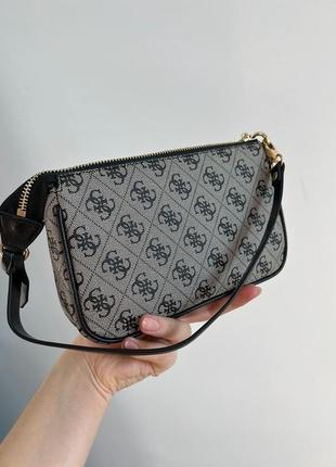 Небольшая компактная женская брендированная сумочка guess6 фото
