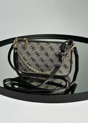 Невелика компактна жіноча брендована сумочка guess7 фото