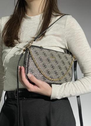 Небольшая компактная женская брендированная сумочка guess2 фото