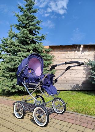 Детская комбинированная коляска eichhorn sandman с жесткой люлькой синий/розовый (417rfs-s010-air-ftc)