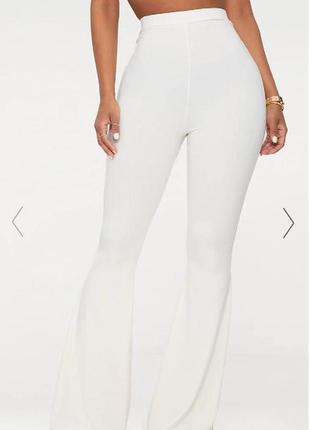 Белые женские брюки клеш, м6 фото