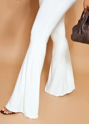 Белые женские брюки клеш, м3 фото