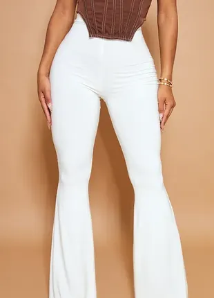 Белые женские брюки клеш, м1 фото