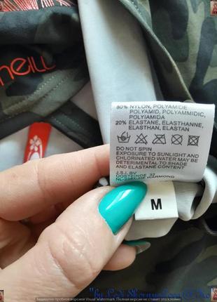 Фирменная мини-юбка в защитный принт с рисунком сбоку,размер м-л7 фото