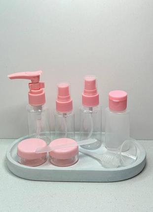 Набір дорожніх ємностей для косметичних засобів 9 предметів колір рожевий3 фото