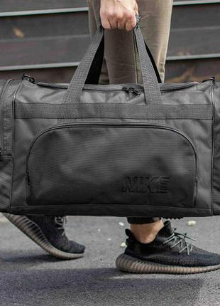 Мужская дорожная спортивная сумка nike rec черная тканевая для путешествий на 60л