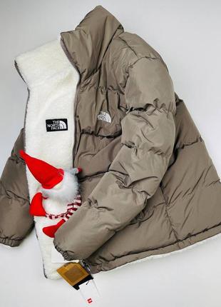 Двусторонняя куртка меховушка the north face3 фото