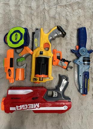 Три пістолета nerf оригінал інтерактивний меч світилься звук і складається в пістолет ціна за все