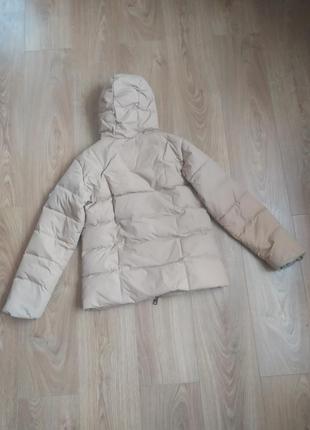 Жіноча зимова коротка куртка2 фото