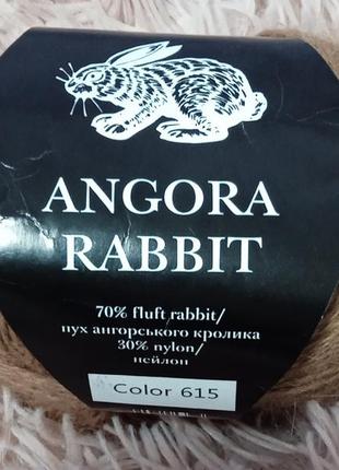 Комплект шапка и снуд связаны спицами из пуха ангорского кролика