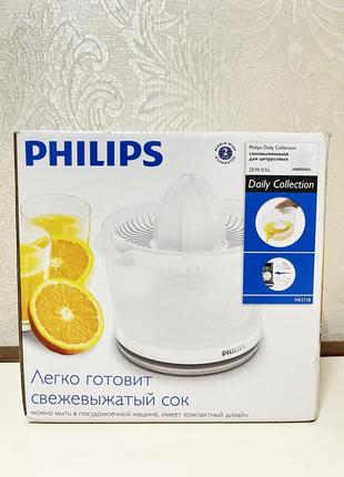 Соковитискач для цитрусових philips hr 27381 фото