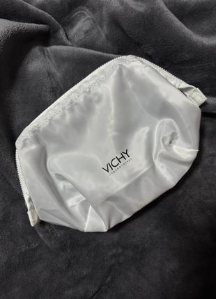 Vichy косметичка біла нова атласна тканина