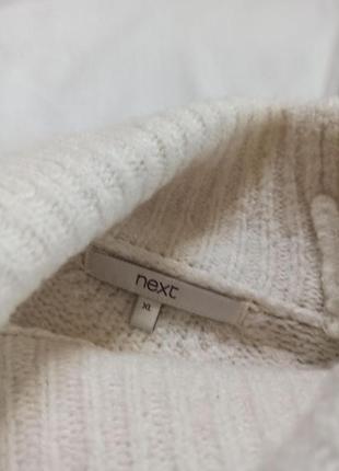Белый удлиненный объемные свитер с высокой горловиной/с косами4 фото