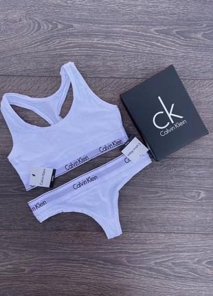 Комплект женского белья calvin klein топ+стринги
или топ + слипы