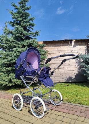 Детская комбинированная коляска eichhorn combi rfs сине-розовая жесткая люлька (417rfs-s010-eva-ftc)