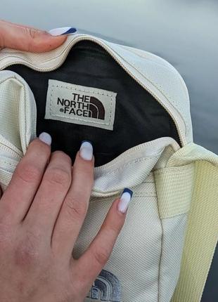 Месенджер the north face, барсетка тнф, сумка через плече чорна/молочна унісекс купити компактний месенджер класика3 фото