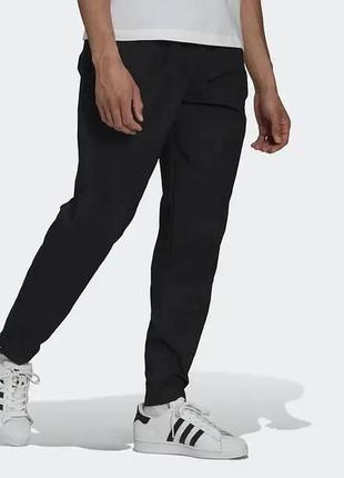 Мужские брюки blue adidas нейлоновые, карманы и манжеты на молнии, черные hn0387 размер m новые с биркой9 фото