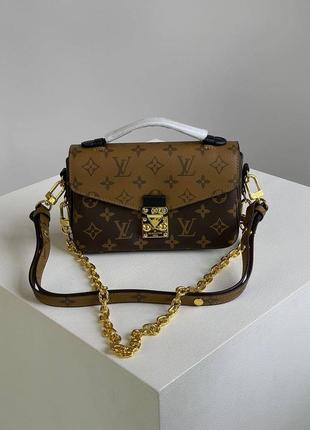 Сумочка louis vuitton pochette métis east west bag