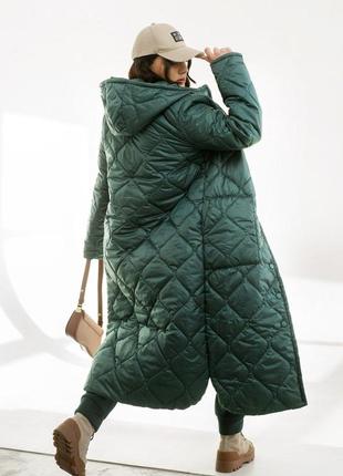 Женская теплая длинная стеганая куртка с капюшоном на кнопках большие размеры 46-682 фото