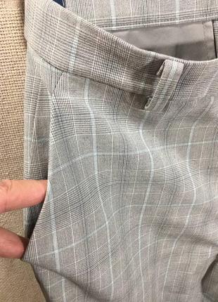 Светло-серые брюки из костюмной эластичной ткани6 фото