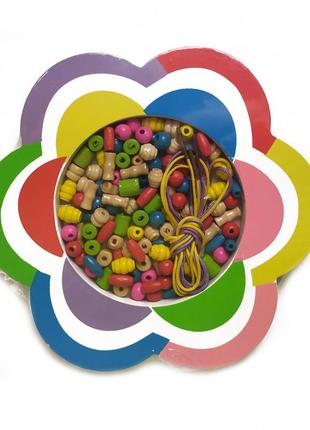 Розвивальна іграшка шнурівка md 2407 дерев'яна (різнобарвна квітка)
