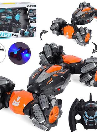 Трюкова машинка на радіоуправлінні "flip spin" оранжева. машинка на пульті радіокерування, на акумуляторі