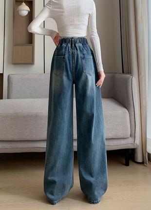 Широкі джинсові брюки.3 фото