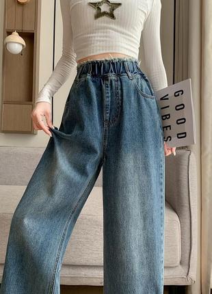 Широкі джинсові брюки.4 фото
