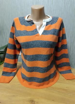 Розпродаж дівочий тонкий светр, кофточка з довгим рукавом. колір смужка помаранчева з сірим.
без дефектів.
склад 70%вовна,30%акрил.