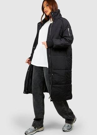 Черное длинное стеганое женское пальто boohoo1 фото