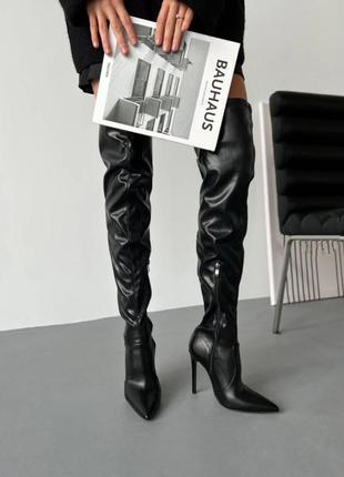 Ботфорти на шпильці