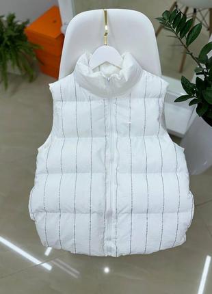 Женская жилетка