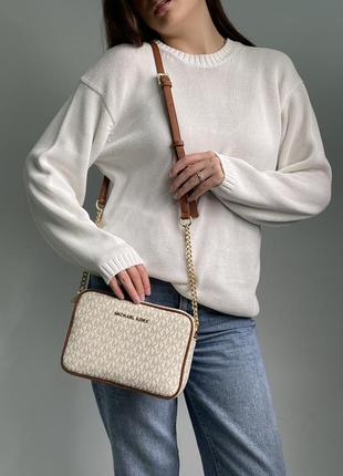 Жіноча сумка преміум якості у брендовому стилі10 фото