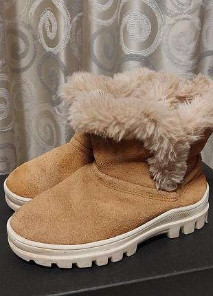 Качественные стильные кожаные сапоги