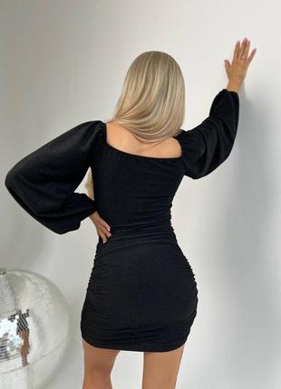 Универсальное черное мини платье из люрекса.2 фото