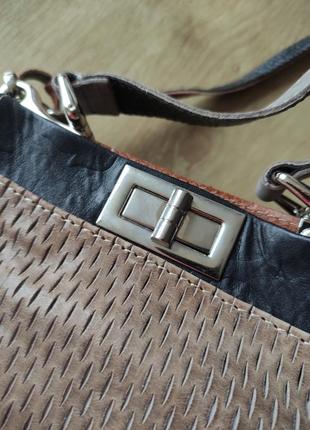 Шикарная женская маленькая кожаная сумочка genuine leather, made in italy..9 фото