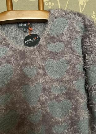 Очень красивый и стильный брендовый вязаный свитер в сердечках 22.5 фото
