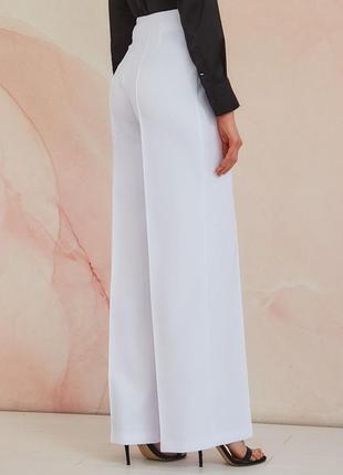Белые брюки палаццо из креп костюмной ткани2 фото
