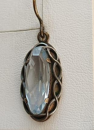 Позолоченные серебренеые серьги с топазами .