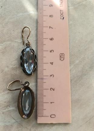 Позолоченные серебренеые серьги с топазами .