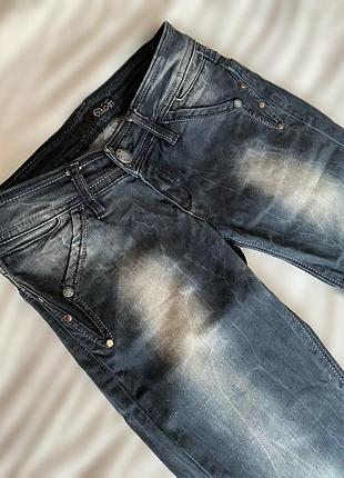Темно сині джинси завужені варенки