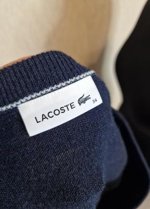 Шикарный шерстяной джемпер, свитер с v-образным вырезом lacoste, оригинал
100% вовна10 фото