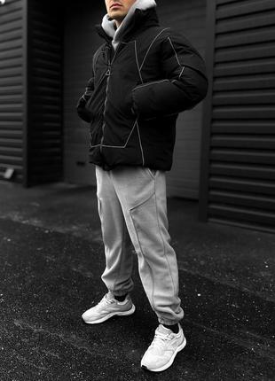 Чоловіча тепла чорна коротка зимова куртка зі світло-відбиваючою стрічкою4 фото