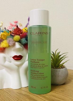 Очищаючий тоннік clarins purifying toning lotion1 фото