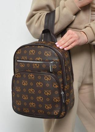 Женский рюкзак с принтом коричневого цвета разные модели