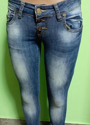 Красиві джинси жіночі облягаючі2 фото