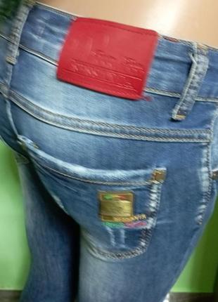 Красиві джинси жіночі облягаючі7 фото