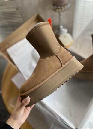 Gerber has styled these same Ugg boots on